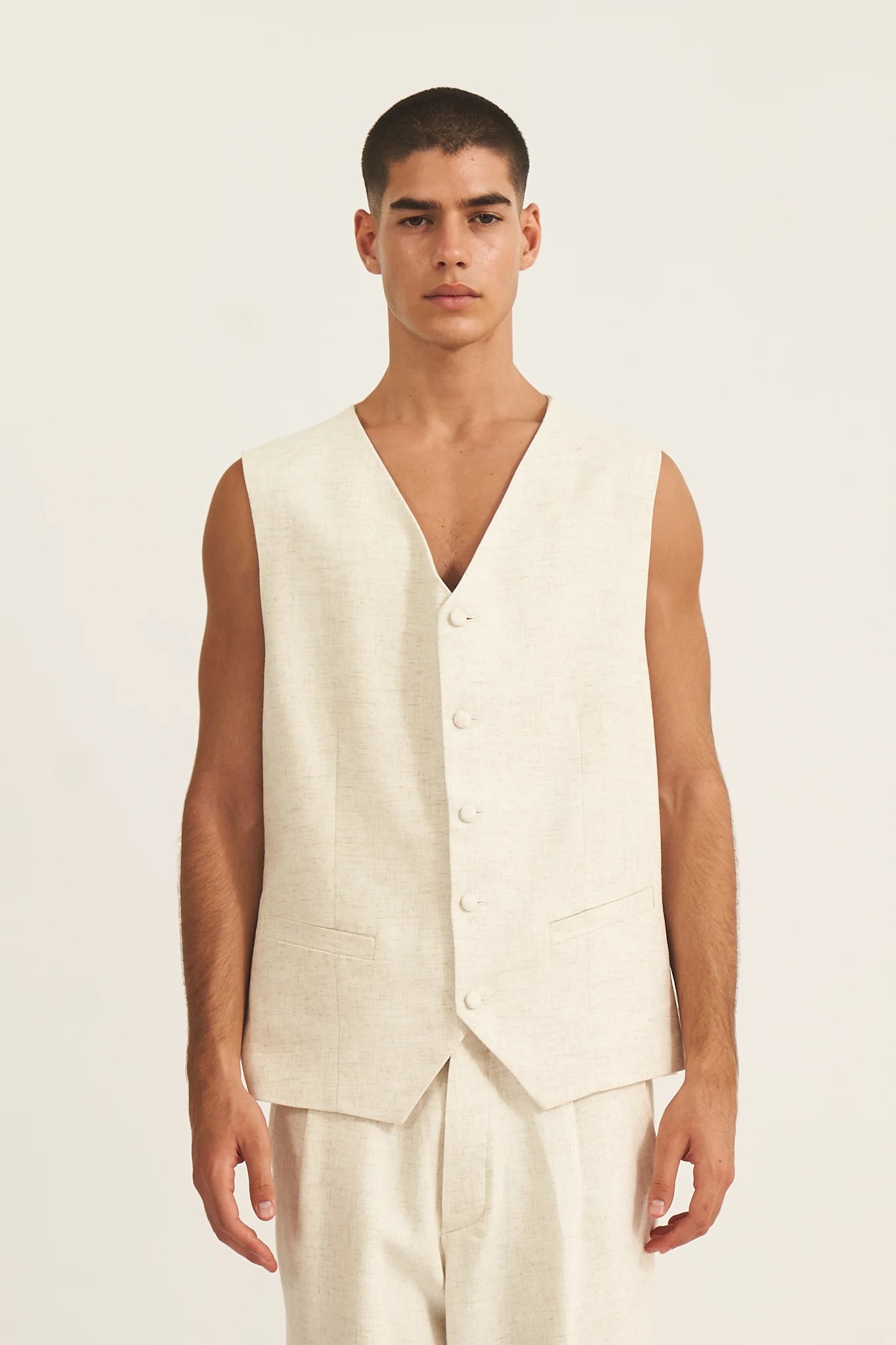 MIRZA ivory tailoring detail